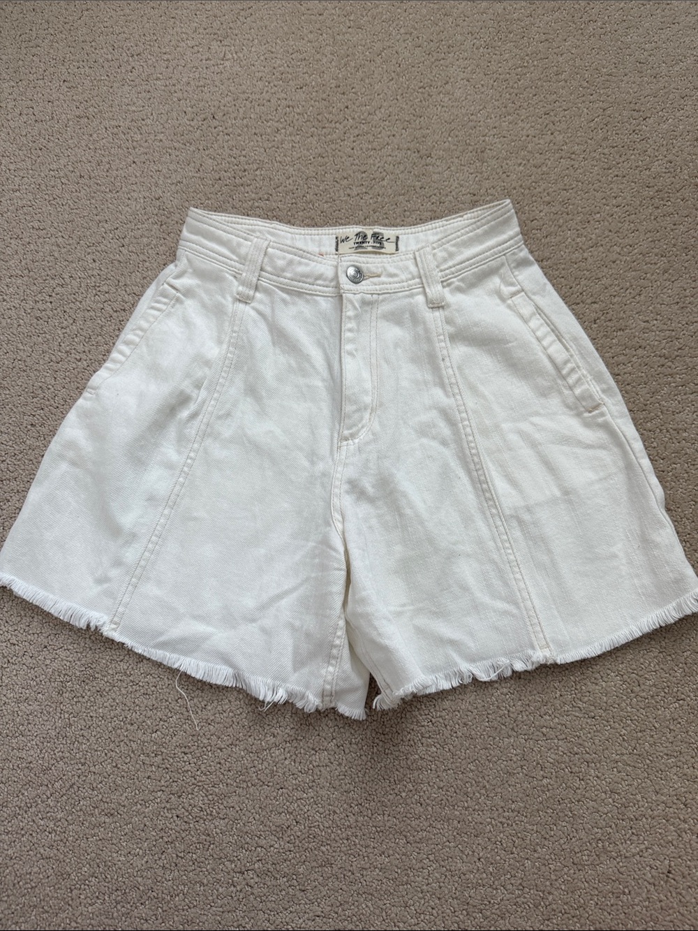Free People white denim shorts